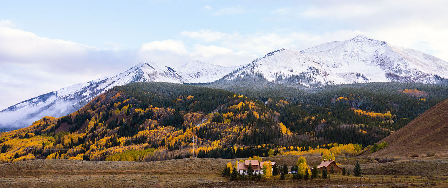 Autumn season in Crested Butte, Colorado with snow capped mountains
